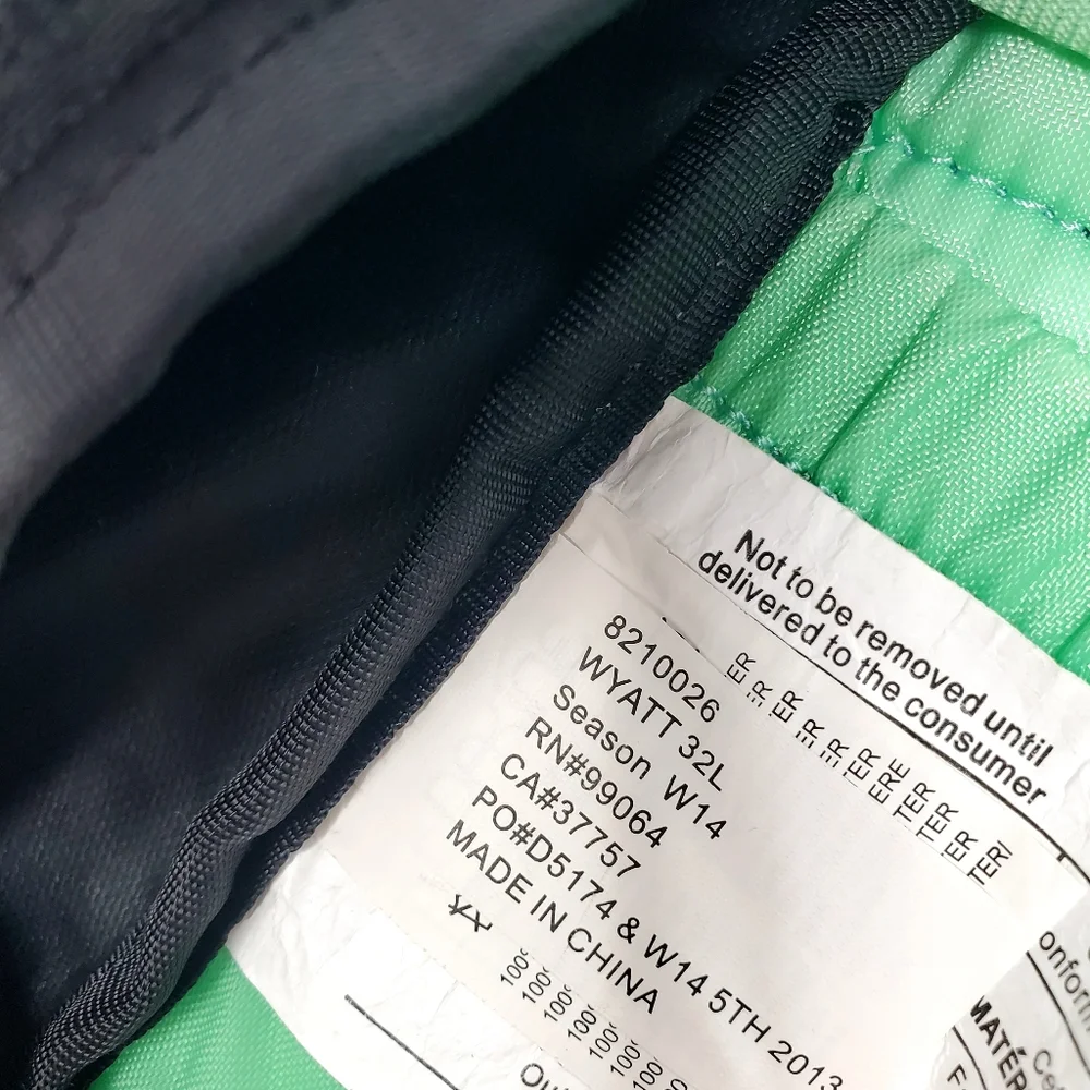 Dakine Wyatt 32L Odette Multi Print Logo backpack ** Some flaws Inside